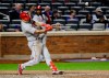 Philadelphia Phillies' Rhys Hoskins hits a two-run home run during the ninth inning of a baseball game against the New York Mets, Wednesday, April 24, 2019, in New York. (AP Photo/Frank Franklin II)