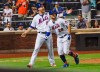 New York Mets' Todd Frazier (21) celebrates with teammate J.D. Davis (28) after they score on a two-run home run by Davis during the seventh inning of a baseball game against the Pittsburgh Pirates Saturday, July 27, 2019, in New York. (AP Photo/Frank Franklin II)