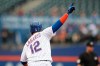 New York Mets' Juan Lagares runs the bases after hitting a two run home run during the fifth inning of a baseball game against the Arizona Diamondbacks, Thursday, Sept. 12, 2019, in New York. (AP Photo/Mary Altaffer)