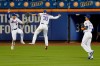 New York Mets outfielders Jeff McNeil, left, Michael Conforto, center, and Aaron Altherr celebrate after a baseball game against the Washington Nationals, Saturday, Aug. 10, 2019, in New York. (AP Photo/Seth Wenig)