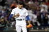 New York Mets relief pitcher Edwin Diaz reacts after striking out Atlanta Braves' Ozzie Albies during the 10th inning of a baseball game Friday, Aug. 23, 2019, in New York. (AP Photo/Mary Altaffer)