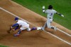 Milwaukee Brewers' Orlando Arcia (3) is thrown out at first base by New York Mets shortstop Amed Rosario as first baseman Pete Alonso, left, stretches to make the catch during the fifth inning of a baseball game, Saturday, April 27, 2019, in New York. (AP Photo/Julio Cortez)