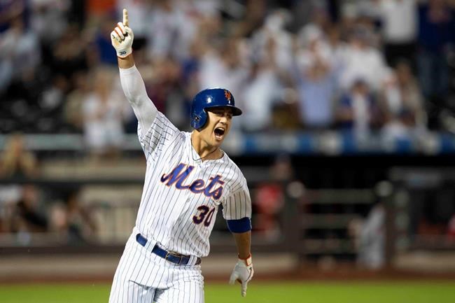 New York Mets' Michael Conforto reacts after hitting a walkoff single during the ninth inning to win the baseball game against the Washington Nationals, Friday, Aug. 9, 2019, in New York. (AP Photo/Mary Altaffer)