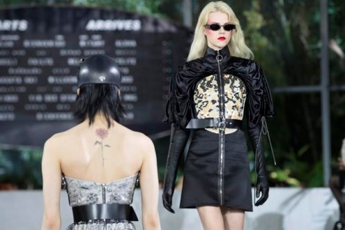 A model walks the runway during the Louis Vuitton Cruise 2020 collection presentation, Wednesday, May 8, 2019, in New York. (AP Photo/Mary Altaffer)