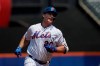 New York Mets' Pete Alonso rounds the bases with a two-run home run against the Miami Marlins in the first inning of a baseball game, Wednesday, Aug. 7, 2019, in New York. (AP Photo/Mark Lennihan)