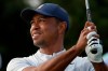 Tiger Woods tees off on the 12th hole at the Northern Trust golf tournament at Liberty National Golf Course, Thursday, Aug. 8, 2019, in Jersey City, N.J. (AP Photo/Mark Lennihan)