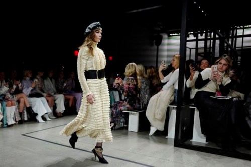 Fashion from the Zimmermann Fall 2019 show is modeled during Fashion Week, Monday, Feb. 11, 2019 in New York. (AP Photo/Mark Lennihan)