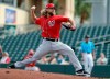 FILE - In this March 1, 2019, file photo, Washington Nationals pitcher Trevor Rosenthal throws during the third inning of an exhibition spring training baseball game against the Miami Marlins, in Jupiter, Fla. Rosenthal has been released by the Nationals, who ran out patience waiting for the reliever to return to form. Rosenthal ends his three-month stint in Washington with a 0-1 record and an unsightly 22.74 ERA. The Nationals made the move Sunday, June 23, 2019 less than 24 hours after he walked all three batters he faced in a 13-9 loss to Atlanta. (AP Photo/Jeff Roberson, File)