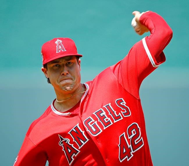 In this June 25, 2018 file photo Los Angeles Angels starting pitcher Tyler Skaggs throws during the first inning of a baseball game against the Kansas City Royals in Kansas City, Mo. Tyler Skaggs has died at age 27, Monday, July 1, 2019. Skaggs started the Angels' game Saturday night against the Athletics. Their game against the Texas Rangers on Monday night has been postponed. (AP Photo/Charlie Riedel, file)