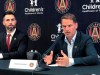 New Atlanta United coach Frank de Boer, right, speaks at an introductory news conference while the team‚Äôs technical director, Carlos Bocanegra, looks on, Monday, Jan. 14, 2019. De Boer is looking to revive his coaching career with the MLS Cup champions after short stints in his two previous jobs at Crystal Palace and Inter Milan. (AP Photo/Paul Newberry)