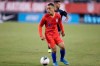 FILE - In this Sept. 6, 2019 file photo United States defender Sergiño Dest looks to pass the ball during an international friendly soccer match against the Mexico in East Rutherford, N.J. Dest received a lot of advice but in the end made up his own mind in deciding to play with the U.S. national team rather than switch to the Netherlands. The 18-year-old outside back, who has a Surinamese-American father and Dutch mother, played for the U.S. in the Under-17 and Under-20 World Cups. 