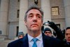 FILE - In this Nov. 29, 2018, file photo, Michael Cohen walks out of federal court in New York. The moment of reckoning has nearly arrived for Cohen, who finds out Wednesday, Dec. 12, whether his decision to walk away from President Donald Trump after years of unwavering loyalty will spare him from a harsh prison sentence. (AP Photo/Julie Jacobson, File)