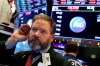 Trader Thomas McCauley works on the floor of the New York Stock Exchange, Thursday, Dec. 6, 2018. U.S. stocks tumbled in early trading Thursday following a sell-off in overseas markets. (AP Photo/Richard Drew)