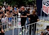 Megan Rapinoe with the U.S. women’s soccer team walks onto a float before the start of ticker tape parade along the Canyon of Heroes, Wednesday, July 10, 2019 in New York. The U.S. national team beat the Netherlands 2-0 to capture a record fourth Women's World Cup title. (AP Photo/Richard Drew)