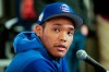 FILE - In this Friday, Feb. 15, 2019, file photo, Chicago Cubs shortstop Addison Russell speaks at a news conference after a spring training baseball workout in Mesa, Ariz. Russell is joining Triple-A Iowa to prepare for his return from a 40-game suspension for violating Major League Baseball's domestic violence policy. Russell is expected to play when Iowa begins a nine-game homestand Wednesday, April 24 against Nashville. (AP Photo/Morry Gash, File)