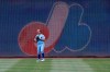 FILE - In this Saturday, July 6, 2019, file photo, Washington Nationals starting pitcher Max Scherzer warms up before a baseball game against the Kansas City Royals, in Washington, as the Nationals are paying tribute to the Montreal Expos in the game by wearing throwback uniforms. The Montreal Expos were the best team in baseball on the morning of Aug. 12, 1994, when players went on strike, leading to the cancellation of the rest of the season. Now the Washington Nationals, the former Expos, are in the World Series and close to accomplishing what so many thought the Expos would have 25 years earlier if they'd had the opportunity. (AP Photo/Nick Wass, File)