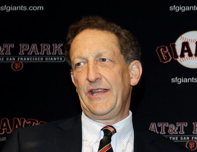 FILE - In this Jan. 19, 2018, file photo, San Francisco Giants President and CEO Larry Baer is shown during a press conference in San Francisco. The San Francisco Giants are planning for Baer to rejoin the club Tuesday, July 2, 2019, following a suspension by the team and Major League Baseball and an absence of nearly four months after a video showed him in a physical altercation with his wife. The Giants said Saturday, June 29, 2019, that Baer attended