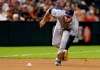 File-This Sept. 21, 2018, file photo shows Colorado Rockies third baseman Nolan Arenado in the first inning during a baseball game against the Arizona Diamondbacks in Phoenix. Arenado likes where he's at and the direction the Colorado Rockies are headed. So he's staying put. For possibly a long, long time. And for a chance to finish what this team has been brewing. The All-Star third baseman agreed to a $260 million, eight-year contract on Tuesday, Feb. 26, 2019, a person familiar with the negotiations told The Associated Press. The person spoke on condition of anonymity because the deal has not been finalized. (AP Photo/Rick Scuteri, File)