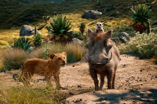 FILE - This file image released by Disney shows, from left, young Simba, voiced by JD McCrary, Timon, voiced by Billy Eichner, and Pumbaa, voiced by Seth Rogen, in a scene from 