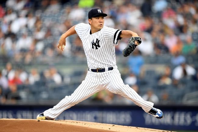 New York Yankees starting pitcher Masahiro Tanaka delivers during the first inning of a baseball game against the Tampa Bay Rays, Monday, June 17, 2019, in New York. (AP Photo/Sarah Stier)