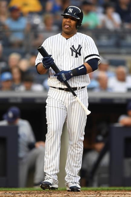 New York Yankees' Edwin Encarnacion reacts after striking out swinging during the second inning of a baseball game against the Tampa Bay Rays, Monday, June 17, 2019, in New York. (AP Photo/Sarah Stier)