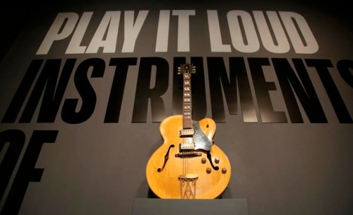 A guitar played by Chuck Berry is displayed at the entrance to the exhibit 