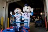 New York Mets mascots Mr. and Mrs. Met pose for pictures with the team's equipment before it is sent to spring training at Citi Field in New York, Monday, Feb. 4, 2019. (AP Photo/Seth Wenig)