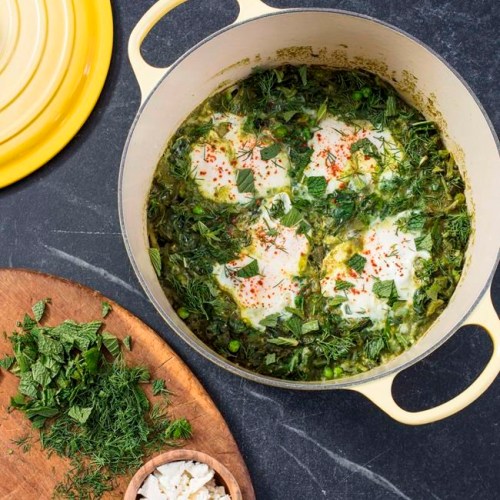 This undated photo provided by America's Test Kitchen in March 2019 shows Green Shakshuka in Brookline, Mass. This recipe appears in the book 