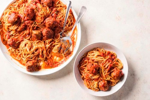 This undated photo provided by America's Test Kitchen in November 2018 shows meatballs and marinara in Brookline, Mass. (Carl Tremblay/America's Test Kitchen via AP)