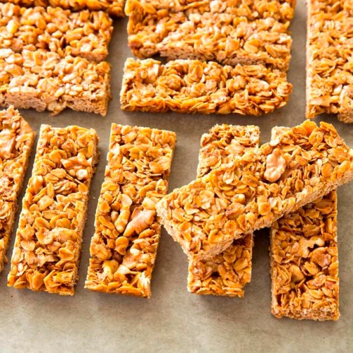This undated photo provided by America's Test Kitchen in March 2019 shows Crunchy Granola Bars in Brookline, Mass. This recipe appears in the cookbook ‚ÄúThe Perfect Cookie.‚Äù (Joe Keller/America's Test Kitchen via AP)