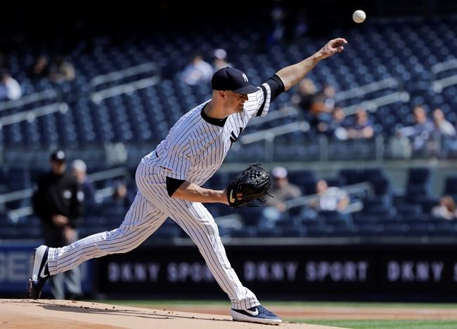 New York Yankees' J.A. Happ delivers a pitch during the first inning of a baseball game against the Baltimore Orioles Wednesday, May 15, 2019, in New York. (AP Photo/Frank Franklin II)