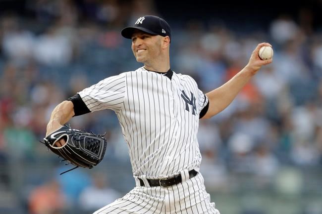 New York Yankees starting pitcher J.A. Happ throws a pitch to Boston Red Sox's Mookie Betts during the first inning of a baseball game Friday, May 31, 2019, in New York. (AP Photo/Julio Cortez)