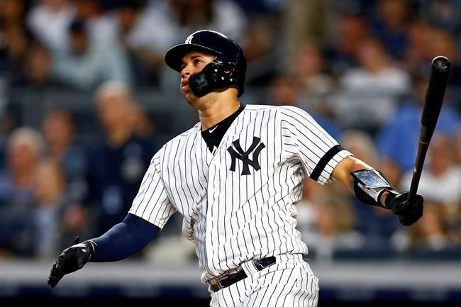 New York Yankees' Gary Sanchez watches his solo home run during the fourth inning of the team's baseball game against the Houston Astros on Thursday, June 20, 2019, in New York. (AP Photo/Adam Hunger)