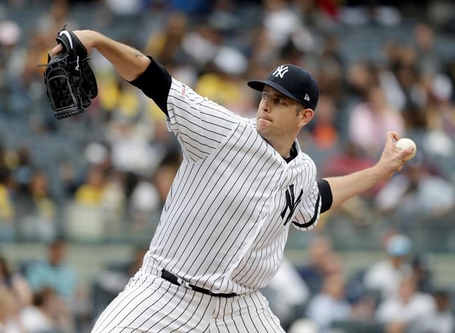 New York Yankees starting pitcher James Paxton throws during the third inning of a baseball game against the San Diego Padres at Yankee Stadium, Wednesday, May 29, 2019, in New York. (AP Photo/Seth Wenig)