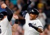 New York Yankees' Aaron Hicks, right, celebrates with designated hitter Luke Voit, after they scored on Hicks' three-run home run during the fifth inning of a baseball game against the Toronto Blue Jays, Monday, June 24, 2019, in New York. (AP Photo/Kathy Willens)