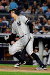 New York Yankees' Aaron Judge follows through on a two-run double during the fourth inning of a baseball game against the Baltimore Orioles on Tuesday, Aug. 13, 2019, in New York. (AP Photo/Frank Franklin II)