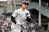 New York Yankees' Aaron Judge runs the bases after hitting a solo home run off Kansas City Royals relief pitcher Heath Fillmyer during the first inning of a baseball game, Saturday, April 20, 2019, in New York. (AP Photo/Julio Cortez)