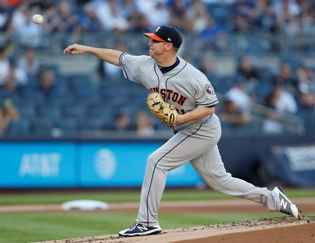 Houston Astros starting pitcher Brad Peacock delivers during the first inning of the team's baseball game against the New York Yankees, Friday, June 21, 2019, in New York. (AP Photo/Kathy Willens)
