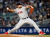 Boston Red Sox starting pitcher Nathan Eovaldi winds up during the fourth inning of a baseball game against the New York Yankees, Wednesday, April 17, 2019, in New York. (AP Photo/Kathy Willens)