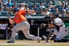 Houston Astros' Tyler White watches his grand slam during the fourth inning of a baseball game against the New York Yankees at Yankee Stadium, Sunday, June 23, 2019, in New York. (AP Photo/Seth Wenig)