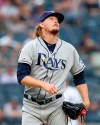 Tampa Bay Rays relief pitcher Ryne Stanek watches a solo home run by New York Yankees' Aaron Hicks during the sixth inning of the first game of a baseball doubleheader Thursday, July 18, 2019, in New York. (AP Photo/Kathy Willens)