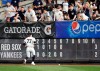 New York Yankees right fielder Clint Frazier (77) jogs after Boston Red Sox's Eduardo Nunez's RBI-single into deep right field after missing it on the first try during the seventh inning of a baseball game Sunday, June 2, 2019, in New York. Nunez reached third on the play. (AP Photo/Kathy Willens)
