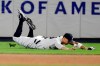 New York Yankees' Aaron Judge loses control of a ball hit by Los Angeles Angels' Albert Pujols for a single fifth inning of a baseball game Wednesday, Sept. 18, 2019, in New York. (AP Photo/Frank Franklin II)
