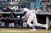 New York Yankees' Gio Urshela follows through on a single during the first inning of a baseball game against the Cleveland Indians, Friday, Aug. 16, 2019, in New York. (AP Photo/Frank Franklin II)