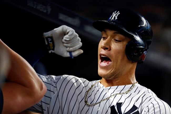 New York Yankees' Aaron Judge celebrates his solo home run during the first inning of a baseball game against the Boston Red Sox on Sunday, Aug. 4, 2019, in New York. (AP Photo/Adam Hunger)