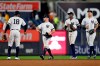 New York Yankees' Didi Gregorius, Brett Gardner, Cameron Maybin and Giancarlo Stanton, from left, celebrate after the Yankees defeated the Houston Astros 10-6 in a baseball game Thursday, June 20, 2019, in New York. )AP Photo/Adam Hunger)