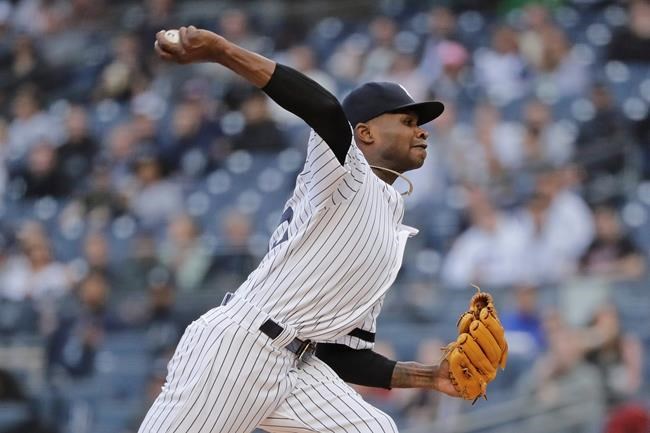 New York Yankees' Domingo German delivers a pitch during the first inning in the second baseball game of the team's doubleheader against the Baltimore Orioles on Wednesday, May 15, 2019, in New York. (AP Photo/Frank Franklin II)