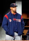 Boston Red Sox manager Alex Cora watches from the dugout steps during the ninth inning of a baseball game, Wednesday, April 17, 2019, in New York as the Yankees defeated the Red Sox 5-3. (AP Photo/Kathy Willens)