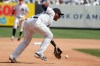 New York Yankees third baseman Miguel Andujar fields a ground ball hit by Minnesota Twins' Nelson Cruz during the seventh inning of a baseball game, Saturday, May 4, 2019, in New York. Andujar overthrew second base while trying to conduct a double play and Twins' Mitch Garver was able to move to third base on the error. (AP Photo/Julio Cortez)