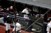 New York Yankees' Aaron Judge, center, clenches his helmet while walking in the dugout after he was pulled from the game after suffering an apparent injury while hitting a single off Kansas City Royals starting pitcher Glenn Sparkman during the sixth inning of a baseball game, Saturday, April 20, 2019, in New York. (AP Photo/Julio Cortez)